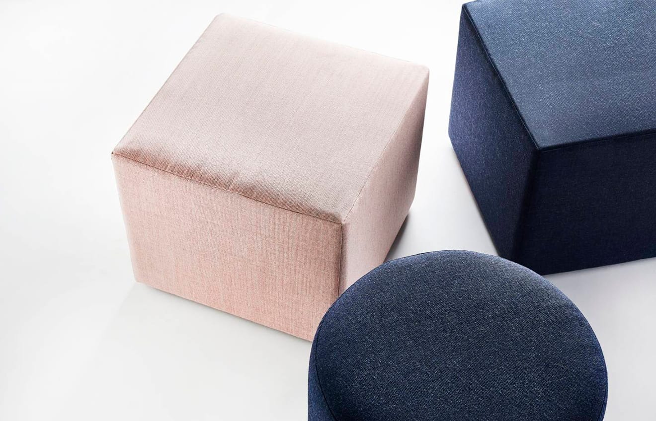 two cube shaped stool and cylindrical stool