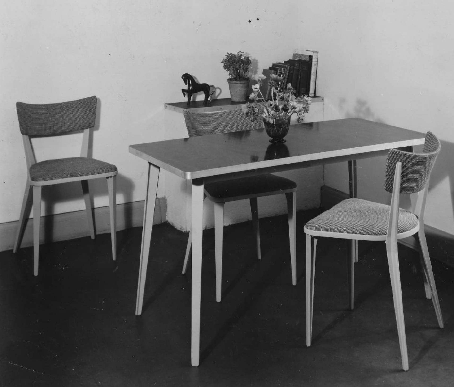 a table and chairs.