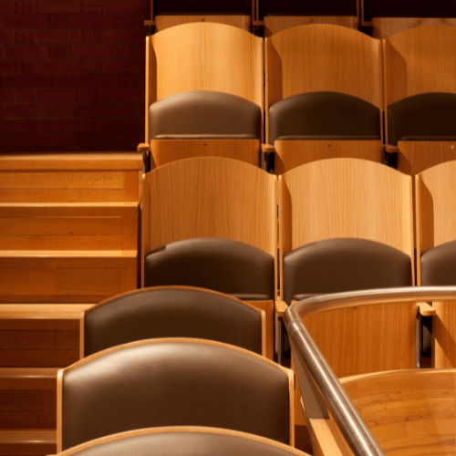 detail of theater style chairs