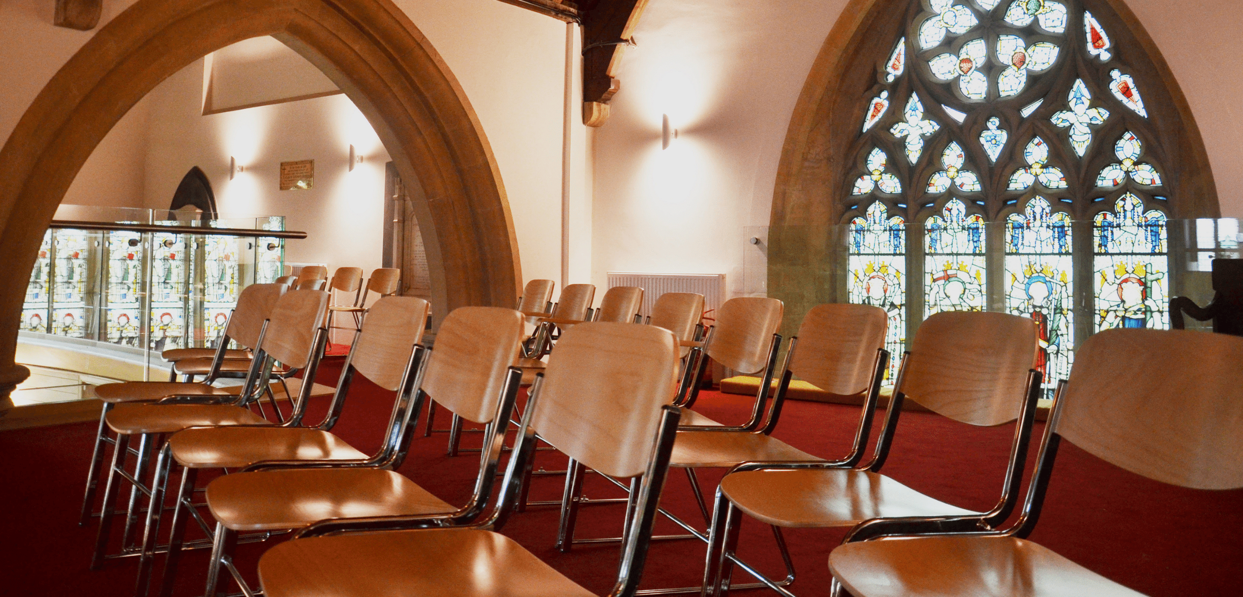 Rows of chairs in a church.