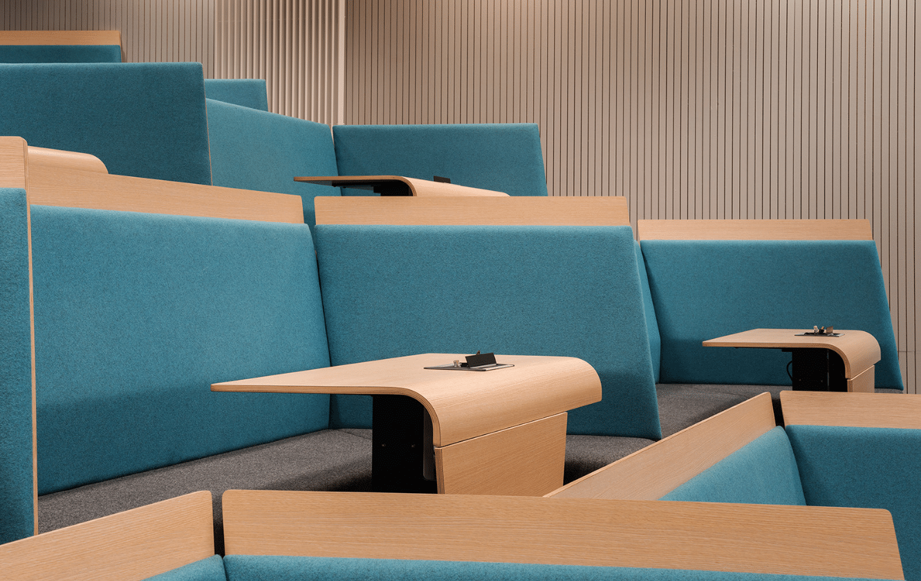 A row of lecture hall seating in a lecture hall.