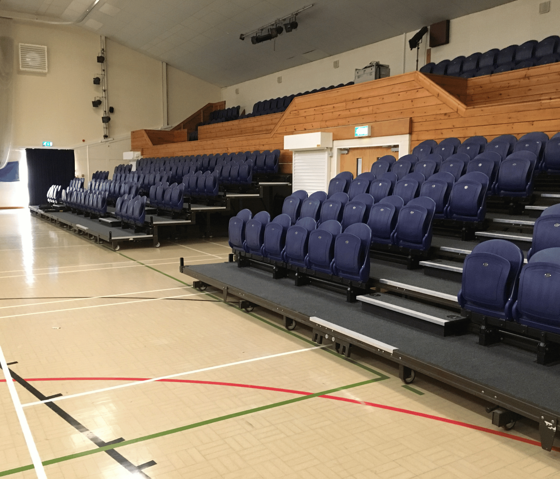 A large auditorium with rows of tiered seating