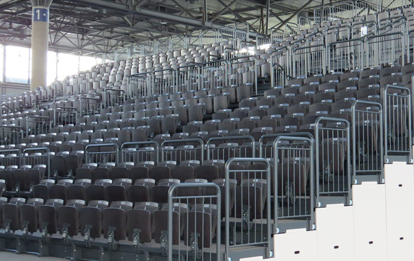 A row of auditorium seating in a stadium.