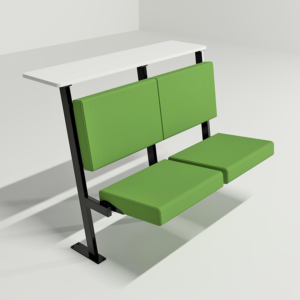 A set of green tip up seating with a white counter table behind them.